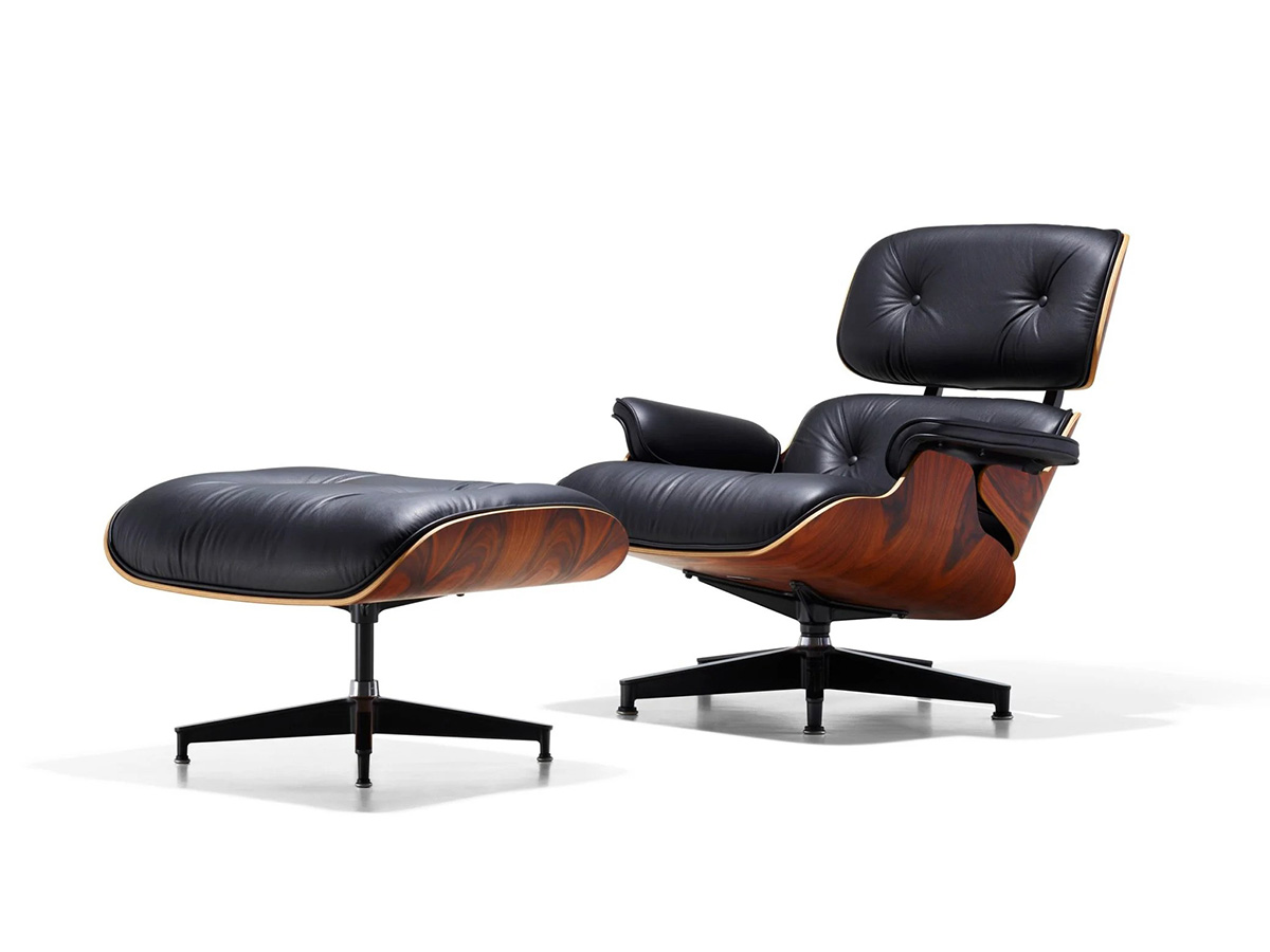 Black leather chair with wooden underside, having a matching footrest.