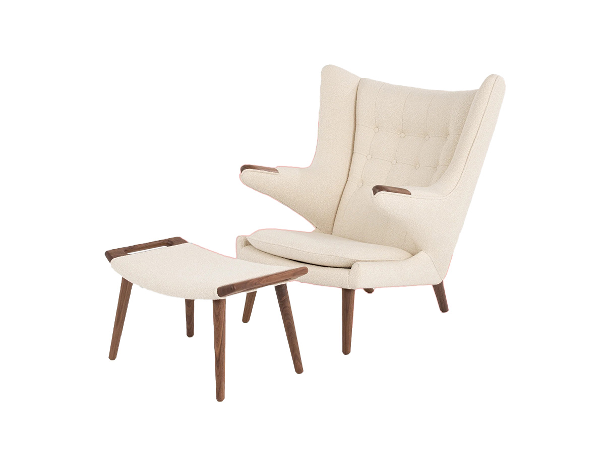 Blue-gray nylon and wood chair with outstretched armrests.