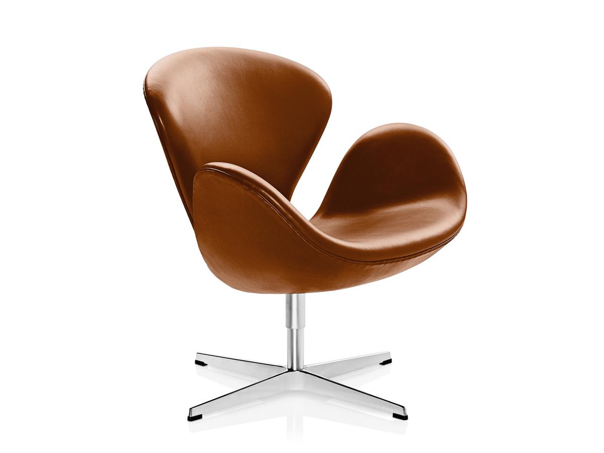 Brown organic shaped rounded chair with silver legs.